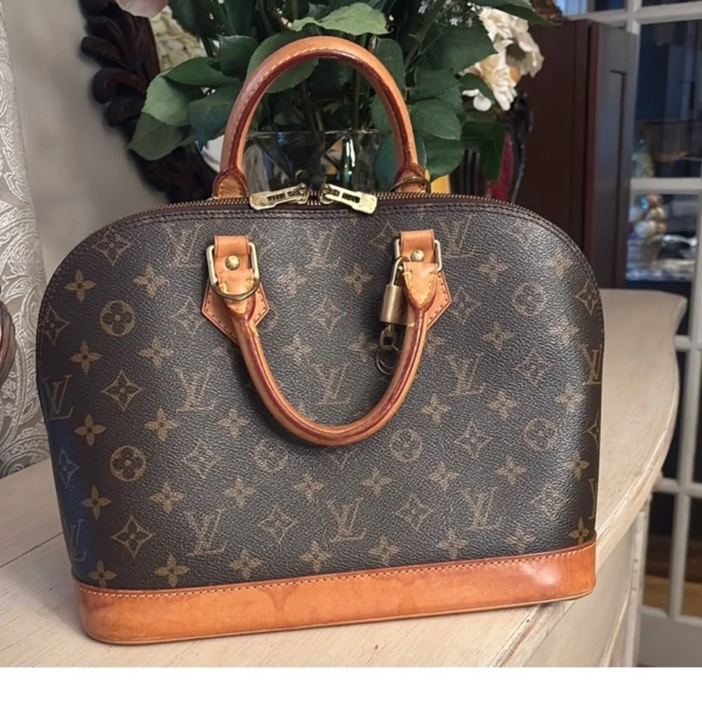 Louis Vuitton AlmaMonogram Handbag
